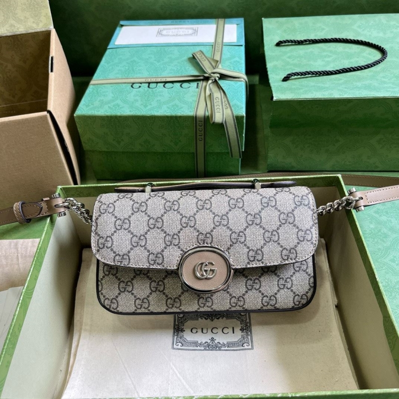 G*u*i satchel bags